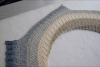 Lace beaded shawl knitted of long gradient dyed fingering weight cotton. The colour is "Ebb Tide".